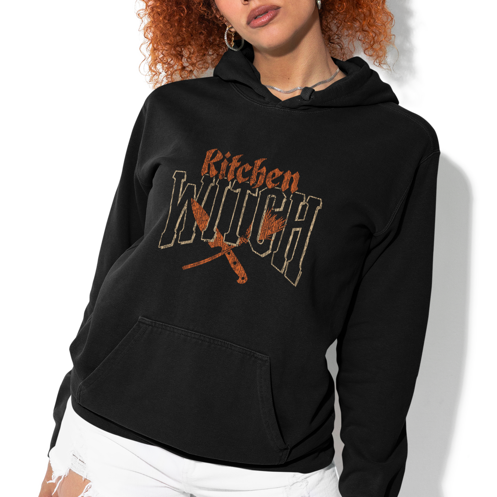 Person wearing a black hoodie with 'DELIRIUM' text on a white background