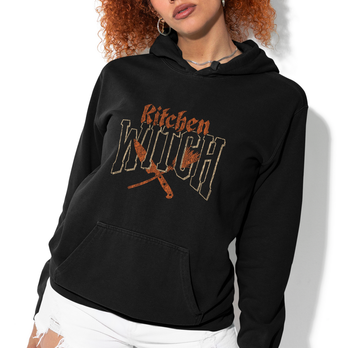 Person wearing a black hoodie with 'DELIRIUM' text on a white background