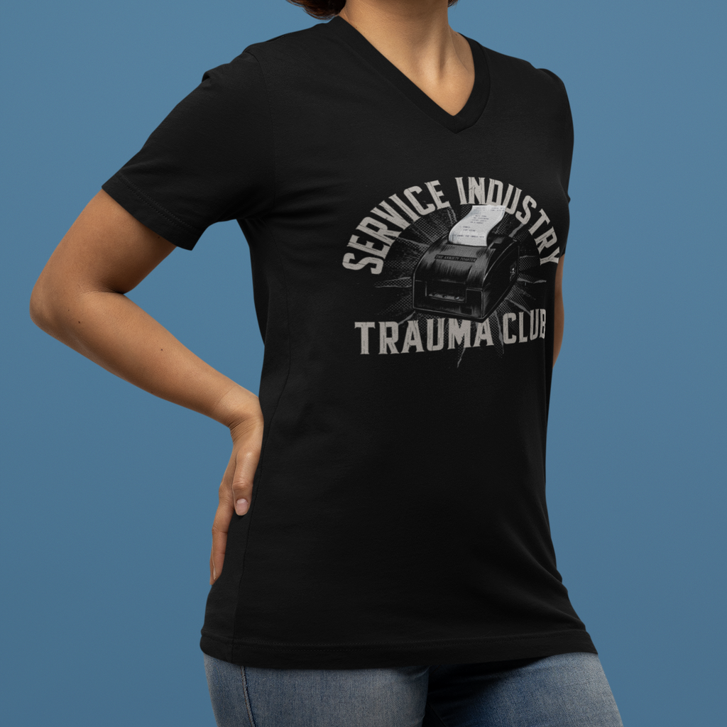 Person wearing a black t-shirt with graphic design and text against a blue background