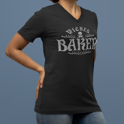 Person wearing a black t-shirt with 'Wicked Baker' design on a blue background