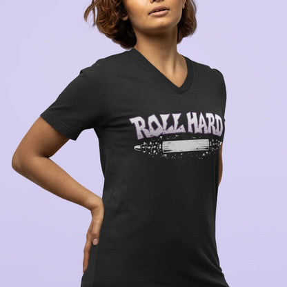 Person wearing a black t-shirt with 'Roll Hard' text on a purple background