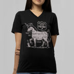 Person wearing a black t-shirt with a unicorn graphic and text on a gray background