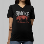 Person wearing a black t-shirt with a graphic design and text on a plain background