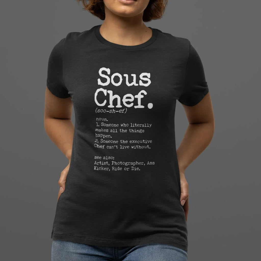 Person wearing a black t-shirt with 'Sous Chef' text and definition on a gray background