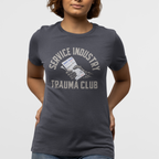 Person wearing a dark gray t-shirt with 'Service Industry Trauma Club' text and graphic on a white background