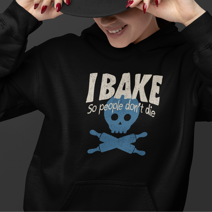 A person wearing a black baseball cap and a black hoodie with a graphic that reads 'IBAKE So people don't die' above a blue skull and crossbones design, posed against a dark gray background.