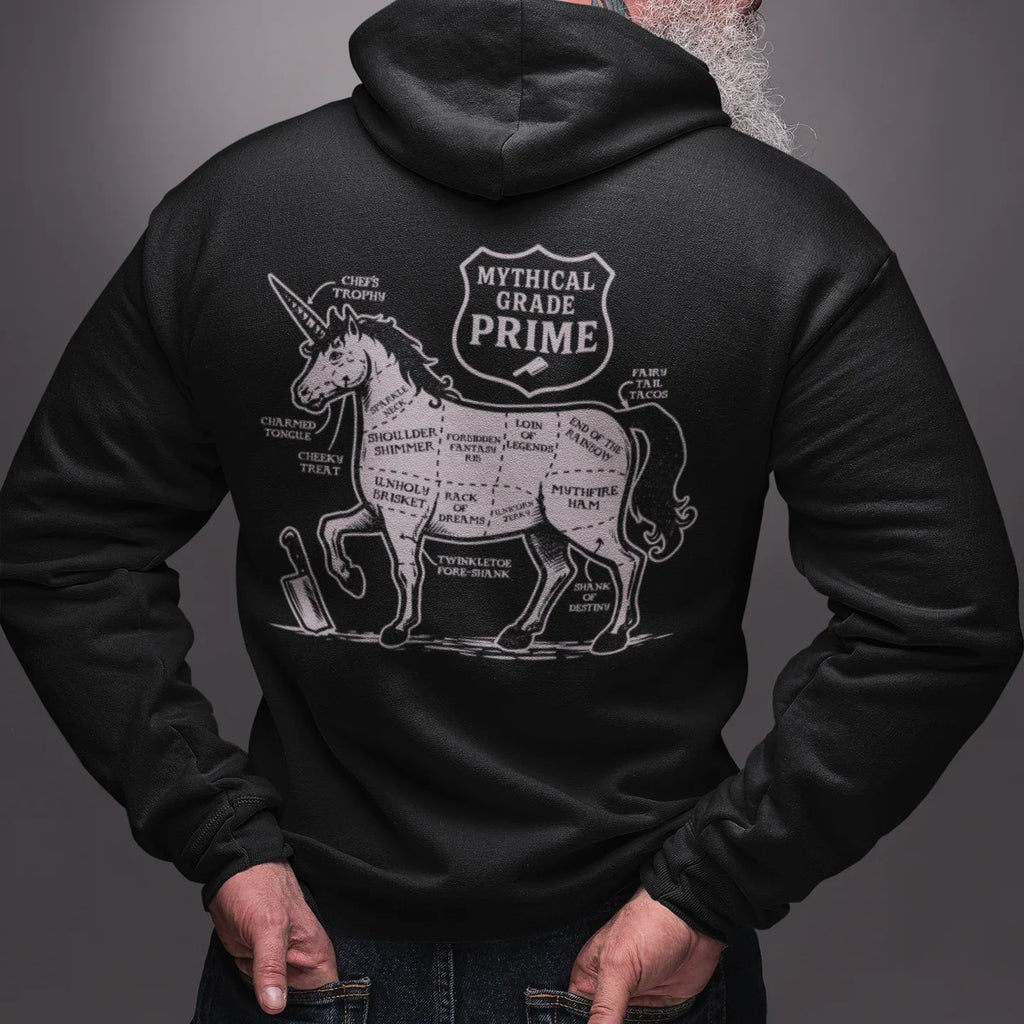 Person wearing a black hoodie with a graphic design on the back, standing against a gray background