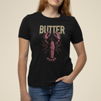 Person wearing a black t-shirt with a lobster graphic and 'BUTTER' text on a beige background