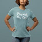 Person wearing a light blue t-shirt with 'I'm with the Chef' text on a gray background