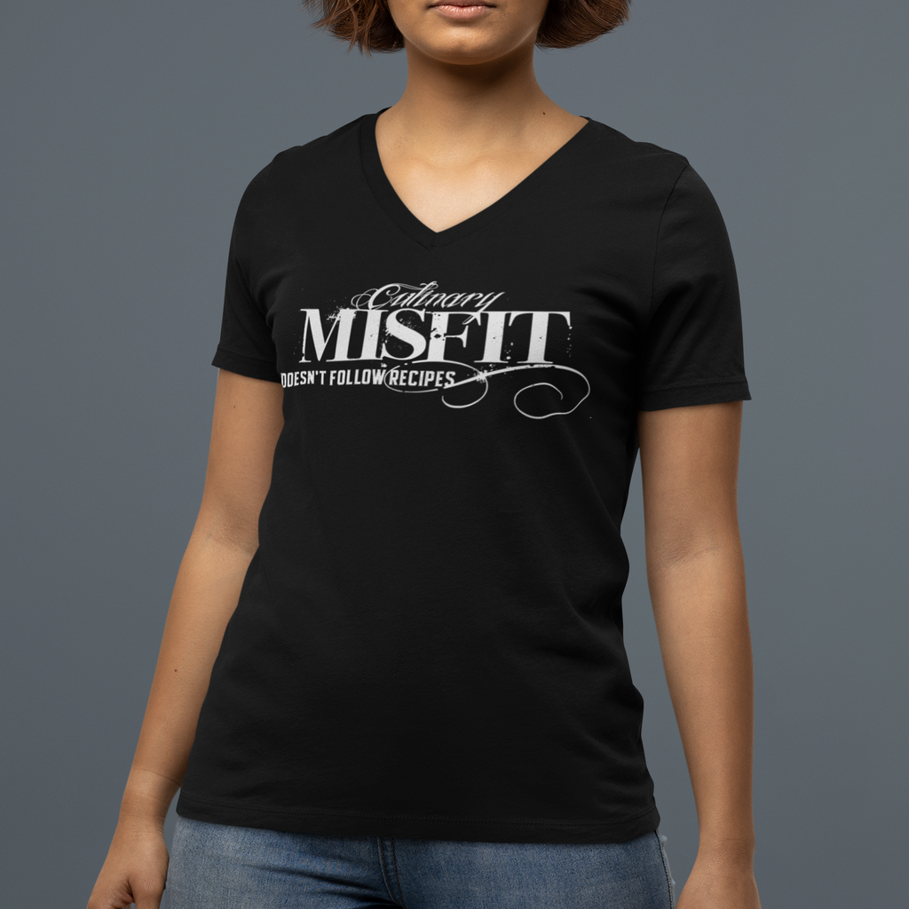 Person wearing a black t-shirt with white text on a gray background