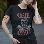 Person wearing a black t-shirt with red text and graphics, standing outdoors.