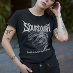 Person wearing a black t-shirt with 'Sourdough' design, standing outdoors.