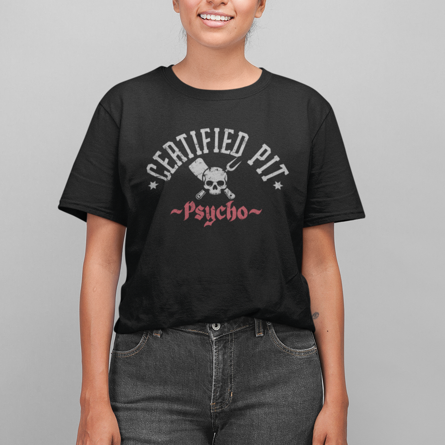 Person wearing a black t-shirt with text and graphics on a gray background