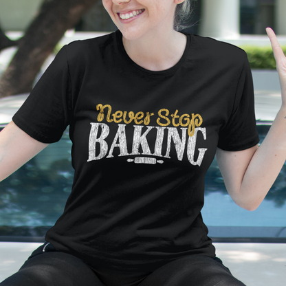 Woman wearing a black t-shirt with 'Never Stop Baking' text, sitting on a car.