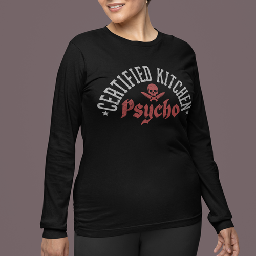 Woman wearing a black long-sleeve shirt with 'Certified Kitchen Psycho' text on a dark background