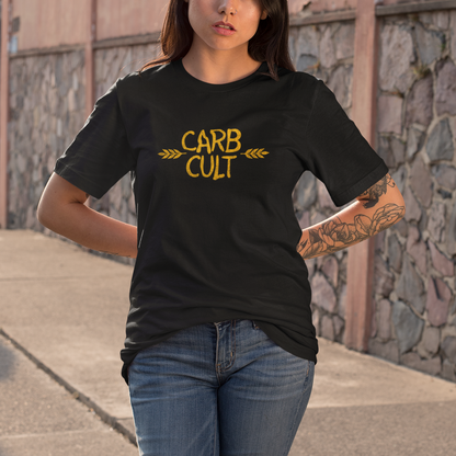 Woman wearing a black t-shirt with 'CARB CULT' text on a stone wall background