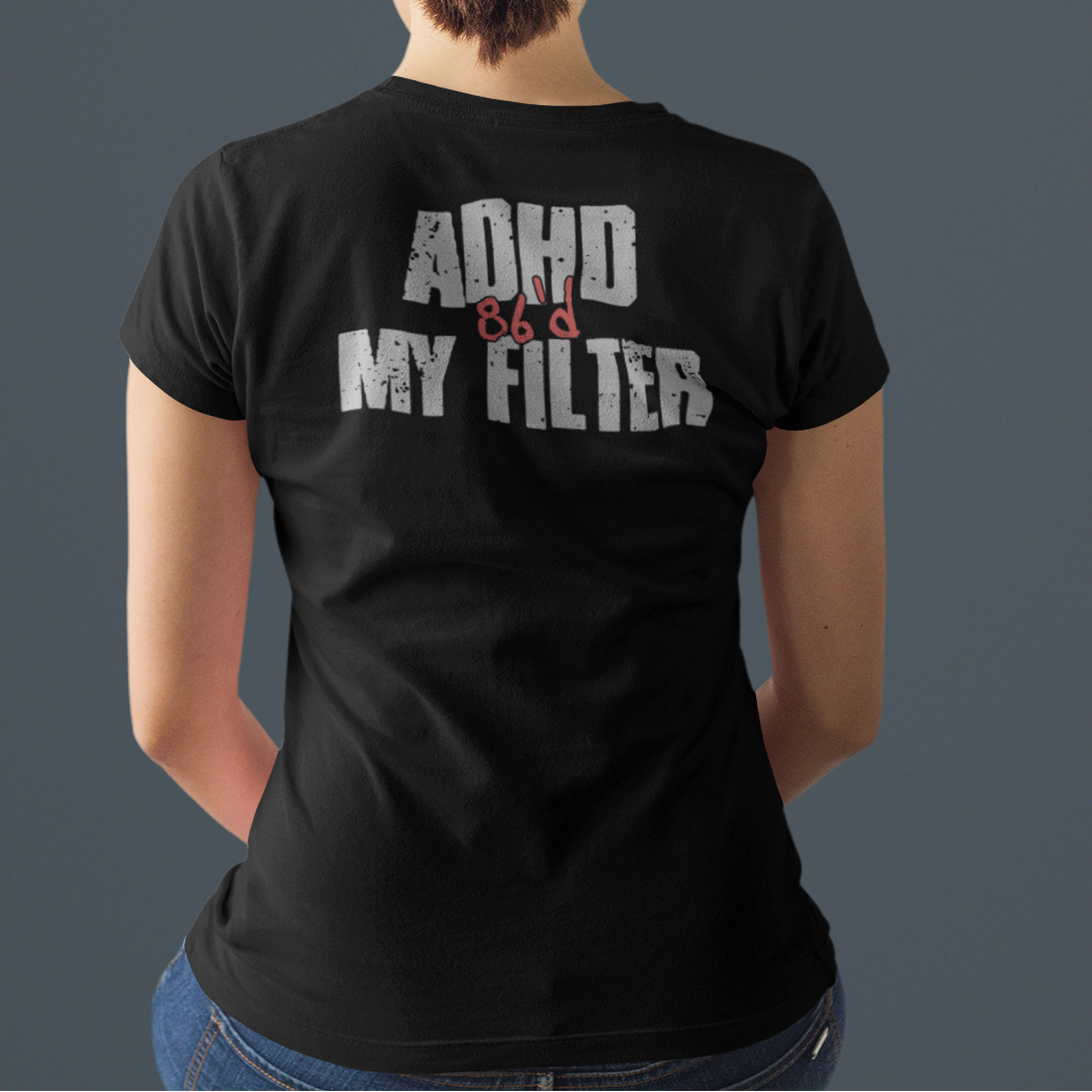 A woman viewed from behind wearing a black t-shirt with the text 'ADHO AND MY FILTER' printed in distressed white and red lettering on the back, set against a solid dark gray background.