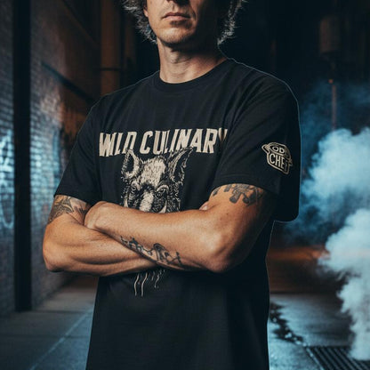 Man wearing a black t-shirt with visible branding in an urban setting