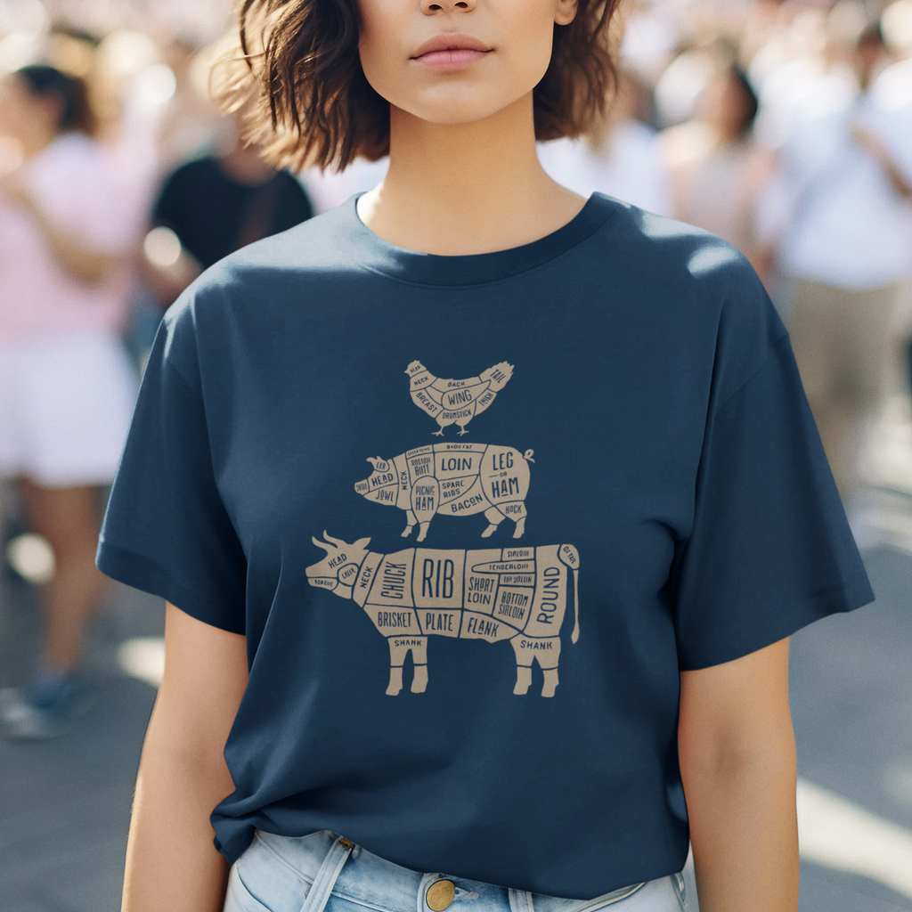 Woman wearing a navy blue t-shirt with animal illustrations in an urban setting