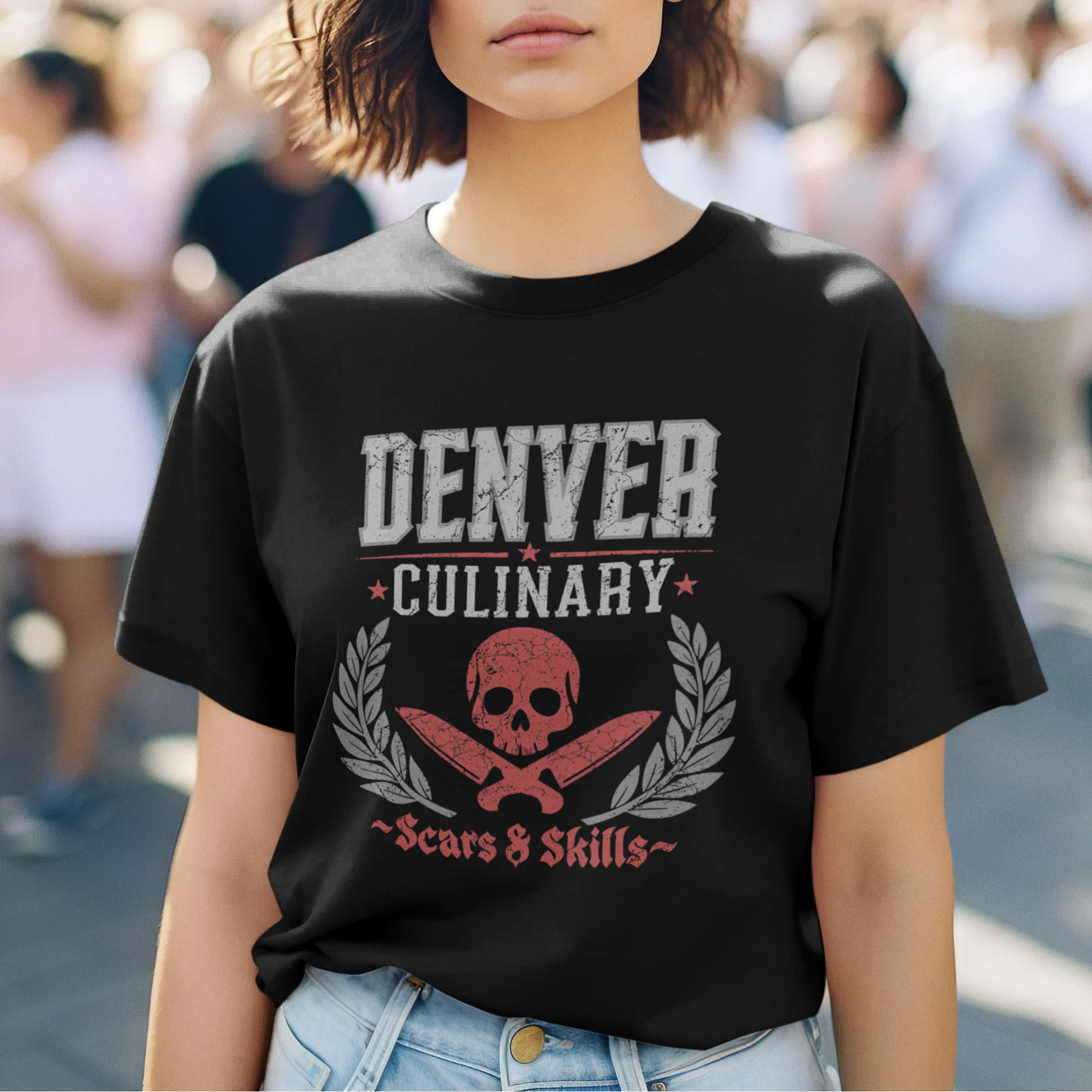 Person wearing a black t-shirt with 'Denver Culinary' design in an outdoor setting