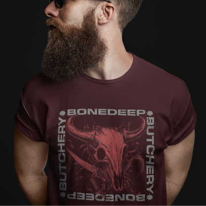 Man wearing a maroon t-shirt with 'Bonedeep Butchery' graphic design on a black background