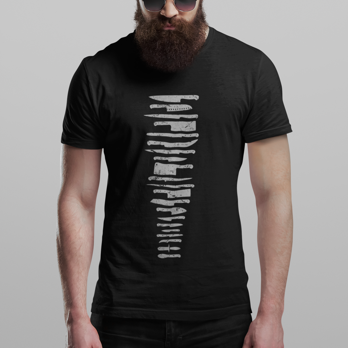 Man wearing a black t-shirt with text on a white background