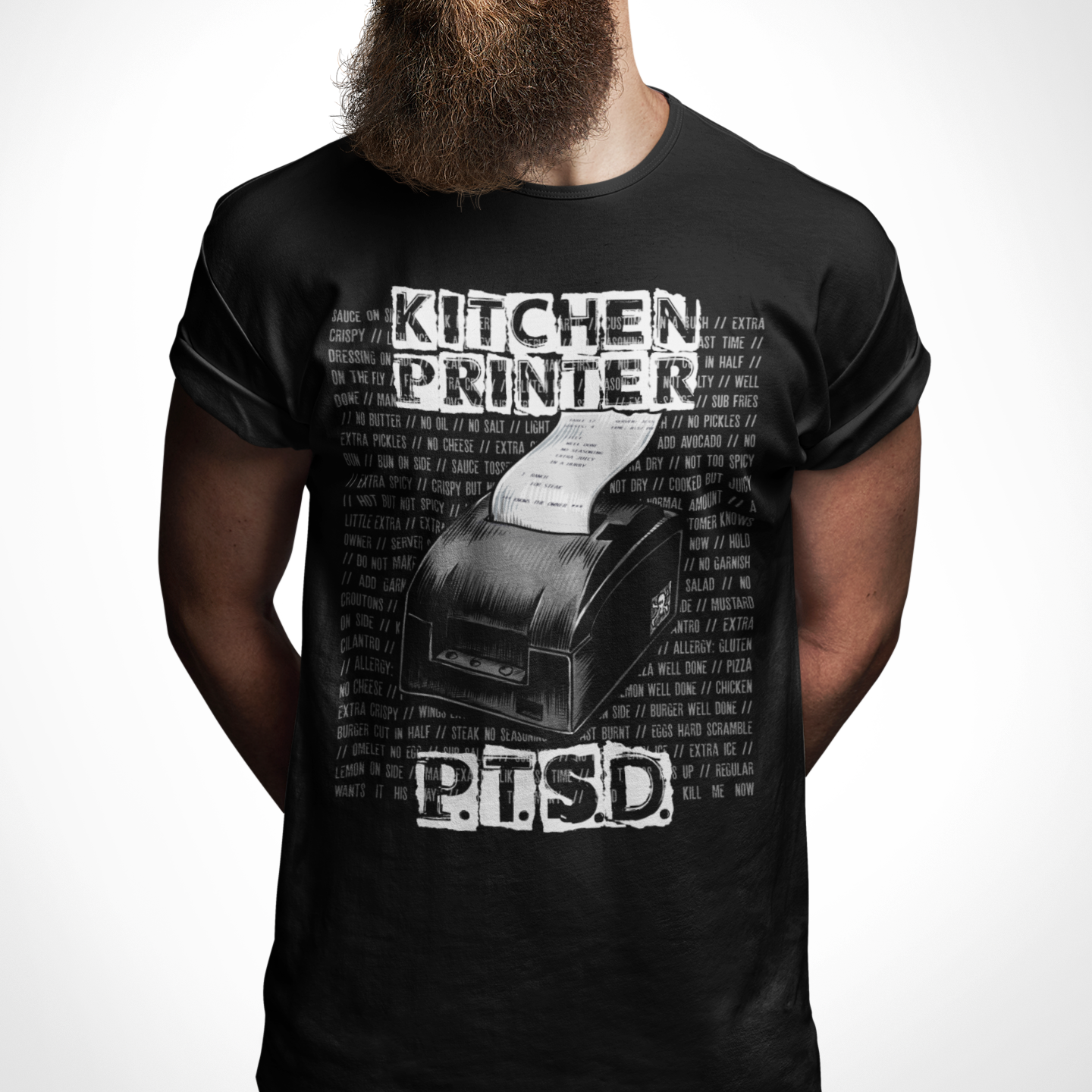 Man wearing a black t-shirt with 'Kitchen Printer' and 'PTSD' graphic design on a white background