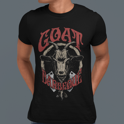 Person wearing a black t-shirt with a graphic of a goat and the text 'GOAT BARBECUE' on a gray background