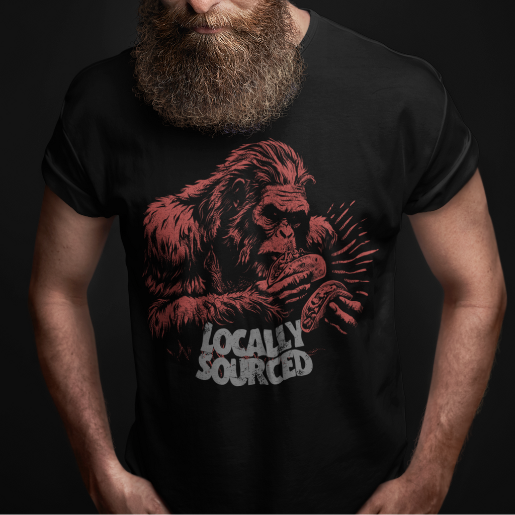 Man wearing a black t-shirt with a red graphic and 'Locally Sourced' text on a dark background