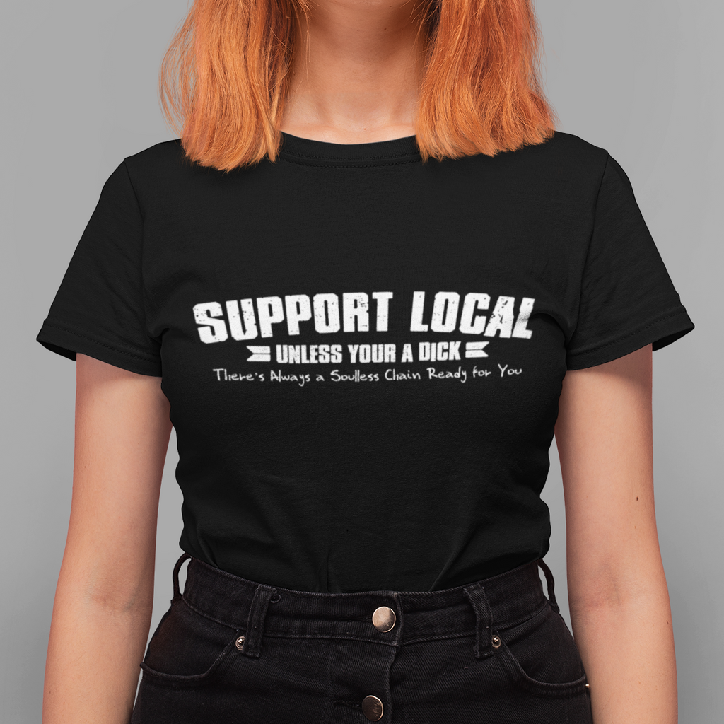 Person wearing a black t-shirt with 'Support Local' text on a gray background