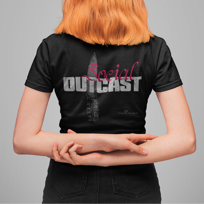 A person shown from the back wearing a black short-sleeve T-shirt with a large graphic print on the back. The shirt features the word 'Social' in pink script and 'OUTCAST' in distressed white block letters over a knife illustration.