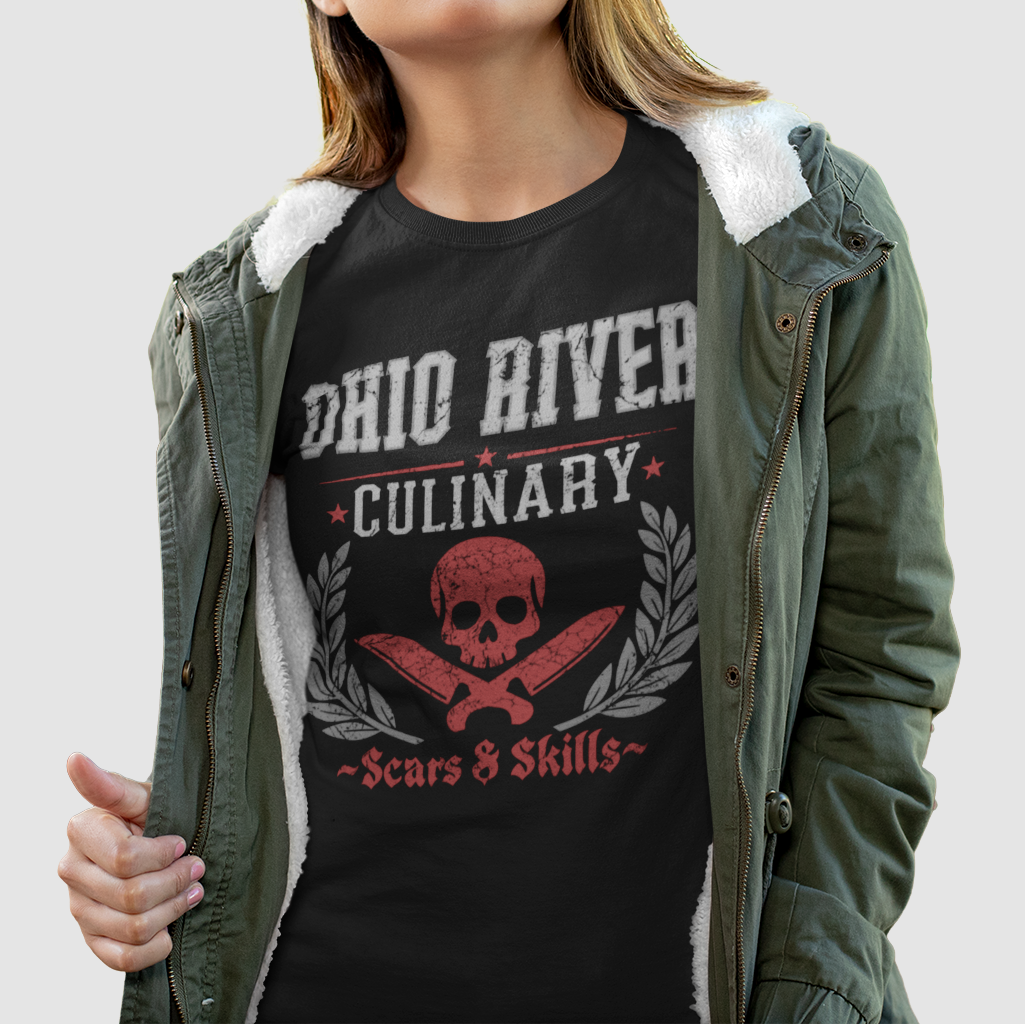 Person wearing a black t-shirt with 'Ohio River Culinary' design, standing against a plain background
