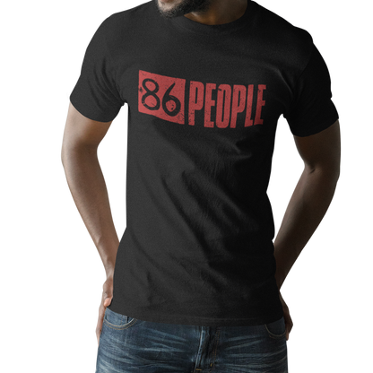 A man wearing a black short-sleeve t-shirt with a distressed red graphic that reads '86 PEOPLE' across the chest, paired with blue jeans, shown against a plain white background.
